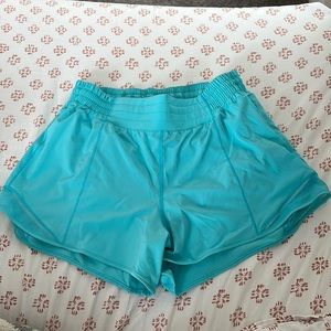 Lululemon hotty hot high rise 4 inch ELECTRIC TURQUOISE!!! So pretty